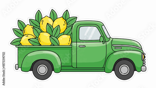 A vintage green pickup truck overflowing with bright yellow lemons and lush green leaves