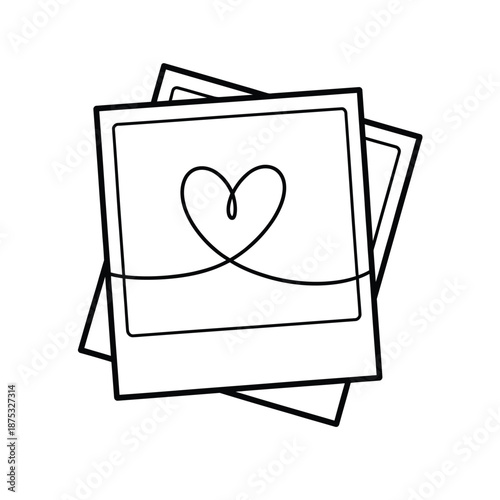 a stack of polaroid photos with a heart drawn on top