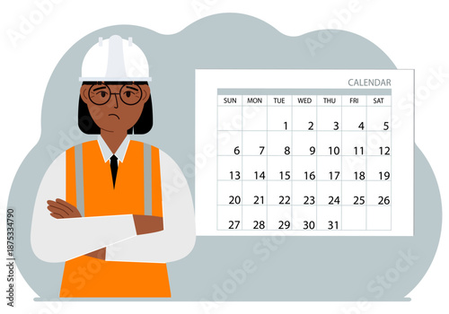 Female builder in uniform next to calendar.