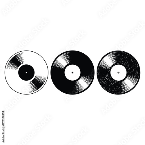 Three vinyl records in different stages of color and design