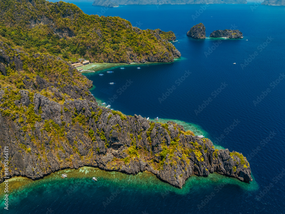 custom made wallpaper toronto digitalaerial view of El Nido, Philippines, featuring emerald lagoons, limestone karst islands, and vibrant tropical waters