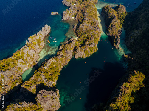 Wallpaper Mural Crystal-clear turquoise water surrounded by dramatic limestone cliffs in the Big and Small Lagoons of Palawan Torontodigital.ca