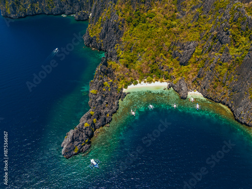 Wallpaper Mural aerial view of El Nido, Philippines, featuring emerald lagoons, limestone karst islands, and vibrant tropical waters Torontodigital.ca
