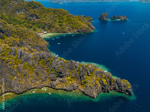 Wallpaper Mural aerial view of El Nido, Philippines, featuring emerald lagoons, limestone karst islands, and vibrant tropical waters Torontodigital.ca