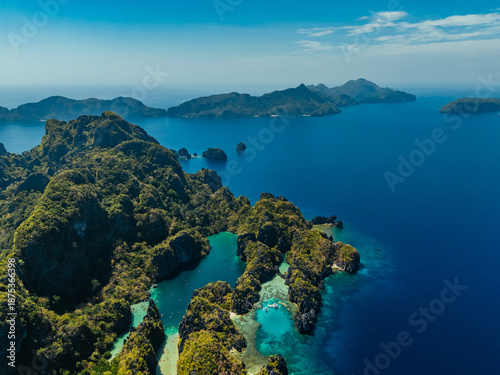 Wallpaper Mural Crystal-clear turquoise water surrounded by dramatic limestone cliffs in the Big and Small Lagoons of Palawan Torontodigital.ca