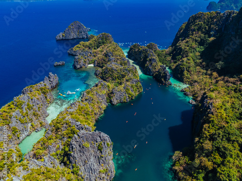 Wallpaper Mural Crystal-clear turquoise water surrounded by dramatic limestone cliffs in the Big and Small Lagoons of Palawan Torontodigital.ca