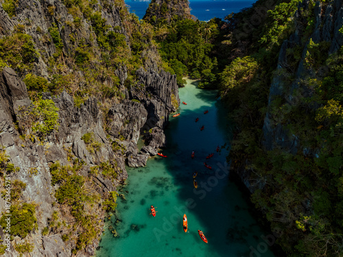 Wallpaper Mural Crystal-clear turquoise water surrounded by dramatic limestone cliffs in the Big and Small Lagoons of Palawan Torontodigital.ca
