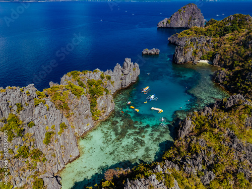 Wallpaper Mural Crystal-clear turquoise water surrounded by dramatic limestone cliffs in the Big and Small Lagoons of Palawan Torontodigital.ca