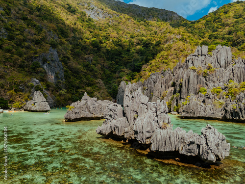 Wallpaper Mural Crystal-clear turquoise water surrounded by dramatic limestone cliffs in the Big and Small Lagoons of Palawan Torontodigital.ca