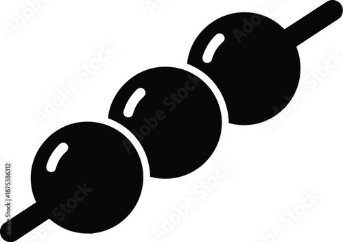 Three meatballs on a stick