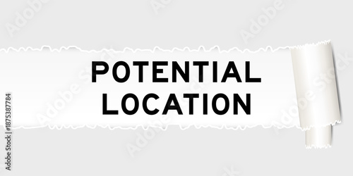 Ripped gray paper background that have word potential location under torn part