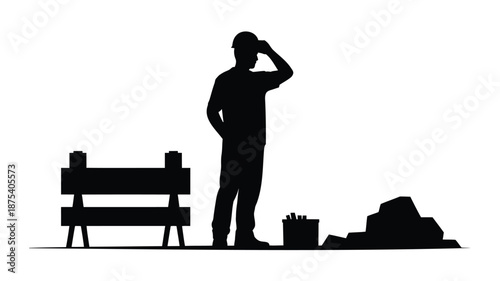 Construction worker standing confidently on a building site