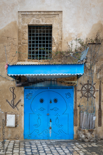 Traditional blue gate in Bizerte medina, Tunisia