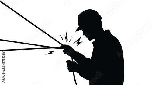 Electrician working with electrical wires in safety gear