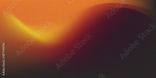 a dark and blurry image with orange and yellow lights