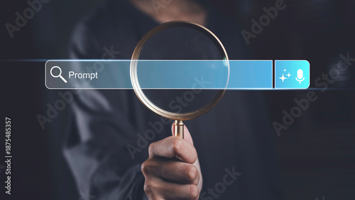 Fotografie Holding magnifying glass with search bar showing the word Prompt, representing AI-powered search optimization, prompt engineering, and digital keyword targeting technology