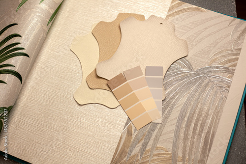 Home interior design. Wallpaper for walls, artificial leather and textiles for furniture making. Renovation and interior planning of the house. Copy space.
