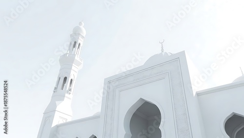 Majestic white mosque with a soaring minaret under a bright sky, showcasing islamic architecture