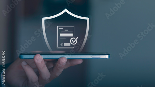 Cybersecurity and data protection. Concept of personal information security, privacy policy, firewall, and secure login for corporate network. Professional holding shield icon with padlock on mobile