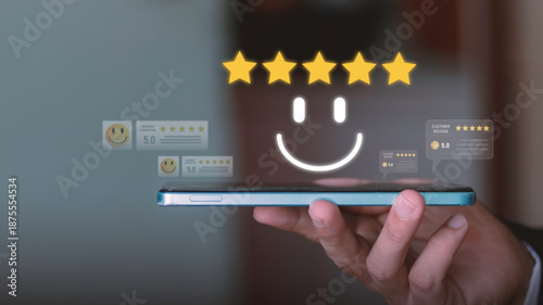 satisfaction, online reviews, service quality, user feedback. Customer experience concept with five star rating and smile icon floating above a smartphone.