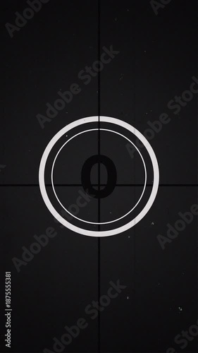 5 seconds vertical old movie countdown with flicker, grain, dust and scratches, fast retro cinema leader for social content