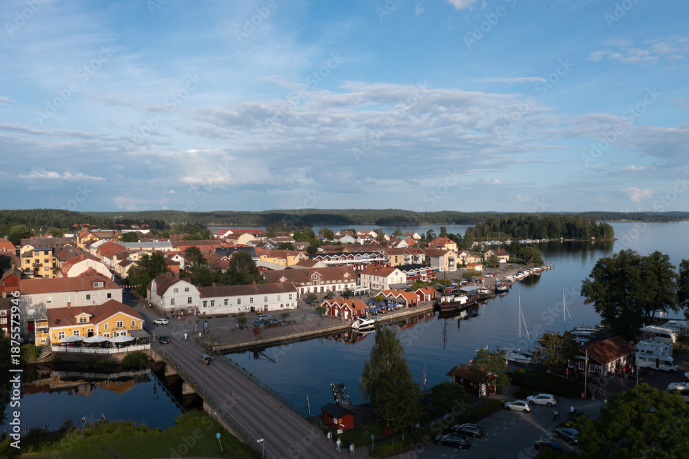 Naklejka premium Aeiral view of a Swedish village at a lake with boats