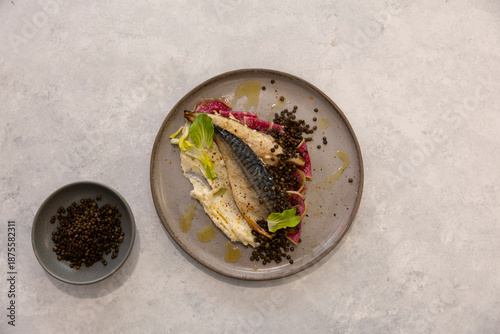 fish served with vegetables and mung beans.