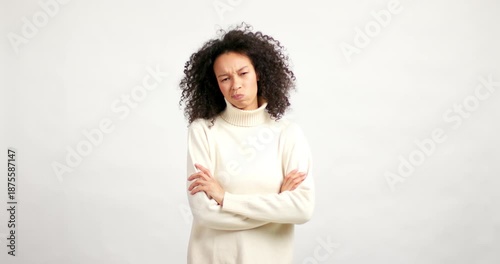 Skeptical african american woman showing disapproval