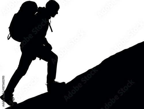 Silhouette of a solo hiker ascending a mountain trail