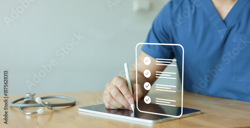 close up young general practitioner hand use stylus pen to check box on medical checklist or opd record to read and diagnose and assess about patient's symptom for healthy and lifestyle concept