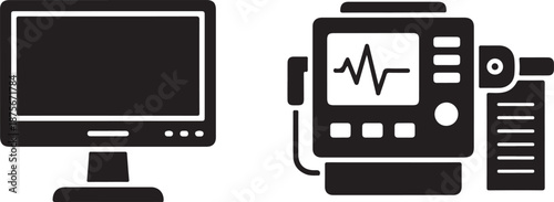 Black and white of computer monitor and medical equipment with heart rate display