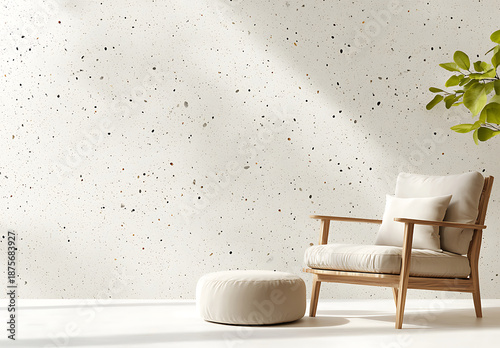Sleek modern interior featuring textured beige wall with speckles, complemented by cozy chair and ottoman, creating serene atmosphere