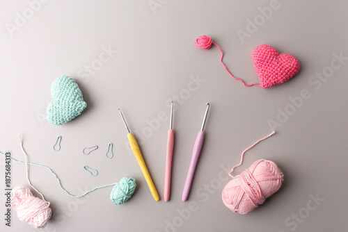 Romantic crochet hearts and knitting supplies. Perfect for seasonal sales romantic holiday marketing gift shops party planners and florist website backgrounds