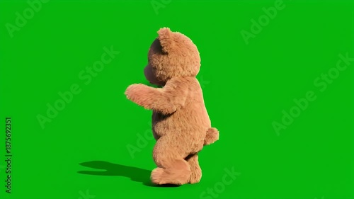 Fluffy brown teddy bear rotating 360 degrees on green screen