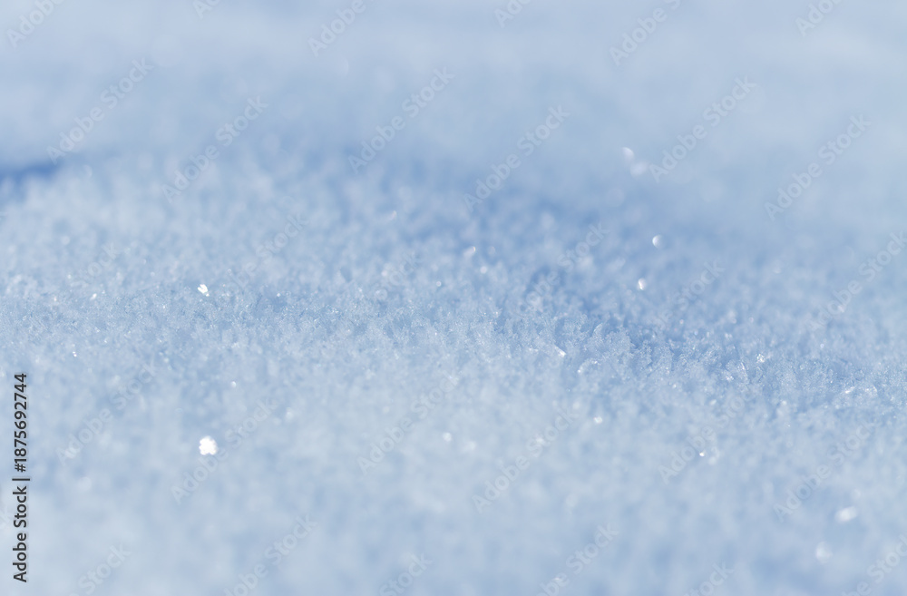 Obraz premium Close-up of snow, untouched snow, sparkling white blanket of snowflakes, ice crystals, pure ground, untouched landscape, white background