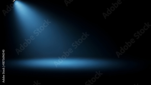 Illuminating the Void: A solitary spotlight pierces the darkness, casting a tranquil blue glow and creating a space of focus and anticipation.