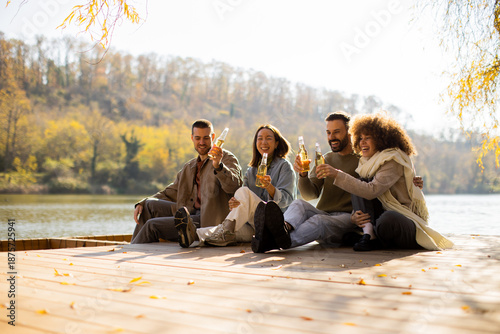 Friends enjoy a sunny lakes...