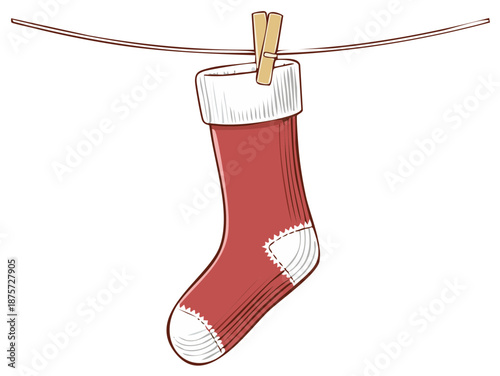 Red Christmas stocking hanging on clothesline with wooden clothespin festive holiday decoration