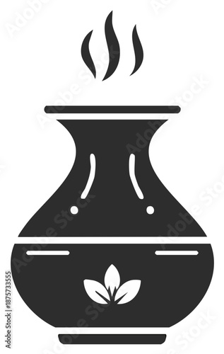 Aroma Diffuser with rising steam and leaves, providing relaxation and a pleasant scent for your home