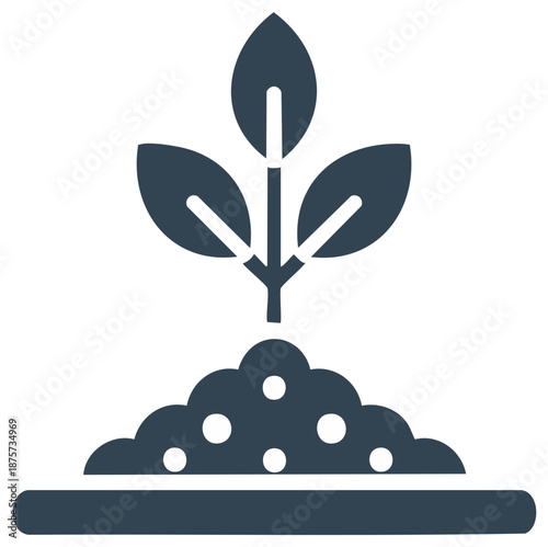 Young plant growing from fertile soil with leaves and a sprout emerging