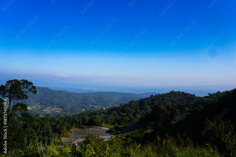 Fototapeta premium Breathtaking Mountain Landscape with Clear Blue Sky and Greenery