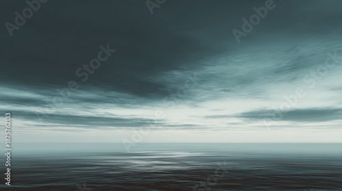 Serene Ocean Landscape with Dark Clouds and Calm Waters at Dusk