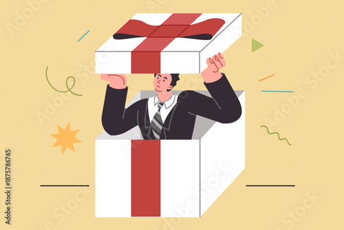 Business gift with man inside giant box decorated with red bow, symbolizing present for partners