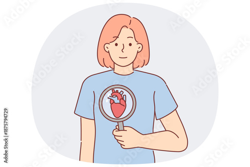 Woman with heart under magnifying glass calls for attention to health of cardiovascular system