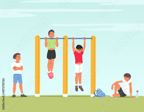 School boys doing pull ups on playground bars
