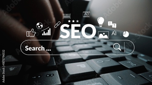 Hands typing on a computer keyboard with SEO icons and search bar depicting digital marketing and online visibility in a modern workspace Gluon. © InfiniteFlow