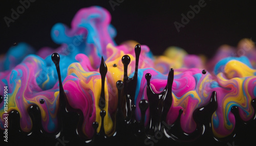 Abstract black ferrofluid spikes in colorful neon oil and water mixture