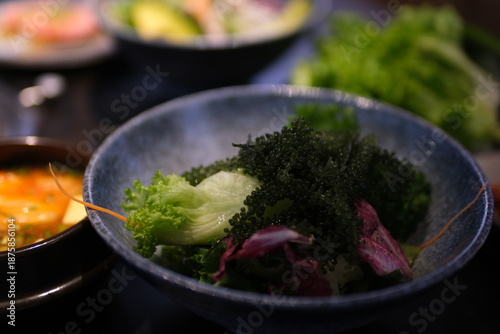 Bowl of fresh green salad mix. High quality photo