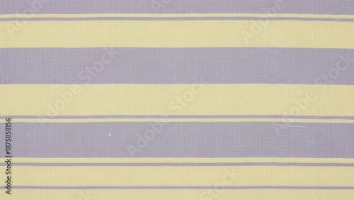 Textured background of linen fabric dyed in a subtle stripe pattern using lavender and soft yellow.