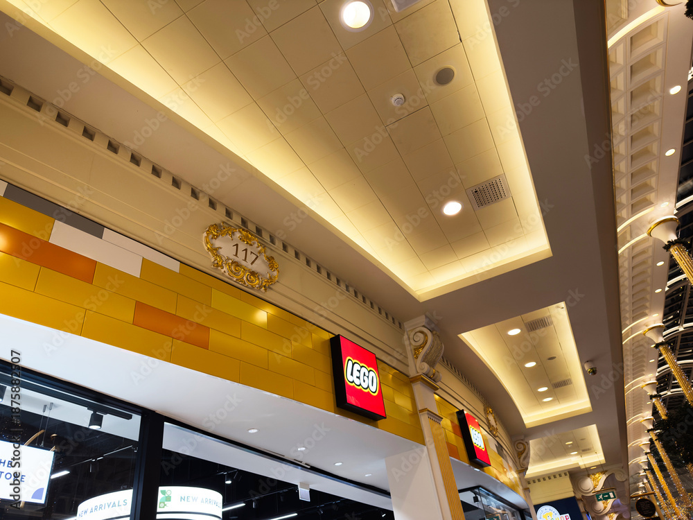Fototapeta premium Bright Lego store interior in Manchester with yellow walls and modern lighting